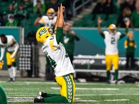 The Edmonton Elks' Sergio Castillo celebrates a game-winning field goal against the Saskatchewan Roughriders on Friday at Mosaic Stadium.