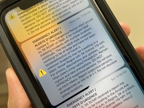 A phone screen displaying multiple RCMP emergency alerts. People in Saskatchewan have been frequently alerted in regards to the mass casualty incident in James Smith Cree Nation.