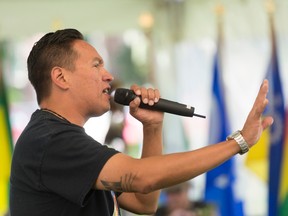 Brad Bellegarde, whose stage name is InfoRed, performs original rap music during National Aboriginal Day celebrations held at Victoria Park on June 21, 2017.