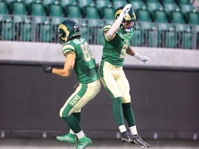 Emmett Steadman, left, D'Sean Mimbs, right, and the University of Regina Rams are sixth in the weekly U Sports football rankings. The two players are shown celebrating a Mimbs touchdown reception during Saturday's 11-10 loss to the University of Saskatchewan Huskies at Mosaic Stadium.