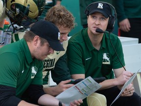 University of Regina head coach Mark McConkey, right, was pleased with the Rams' season-opening win over the Manitoba Bisons on Friday.