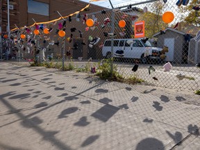 As part of National Day for Truth and Reconciliation, the Eagle Heart Centre organized a walk in memory of children buried at residential schools. Shoes were put on gates of the centre to remind people of the current generation of children that will be walking on their life journeys.