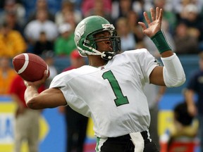 Saskatchewan Roughriders quarterback Henry Burris is shown Sept. 12, 2004 during the inaugural Banjo Bowl against the host Winnipeg Blue Bombers. Burris completed 15 of his first 17 passes during a bounce-back performance.