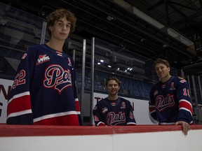 Regina Pats captain Connor Bedard, centre, is flanked by assistant captains Braxton Whitehead, left, and Cole Dubinsky.