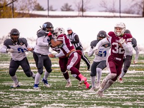 The Regina Thunder's Ryland Leichert takes off for some of the 390 rushing yards he gained on 52 carries in Sunday's 23-14 playoff victory over the Winnipeg Rifles at Leibel Field.