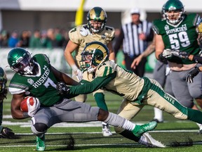 Regina Rams defensive back Jaxon Ford makes a tackle during a 2022 Canada West game against the Saskatchewan Huskies.