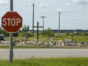 Hockey sticks, messages and other items were placed at a memorial for the Humboldt Broncos bus crash victims at the intersection of Highways 35 and 335 (Liam Richards / Saskatoon StarPhoenix)