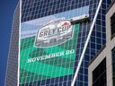 Crews from Sleek Signs put the finishing touches on the Gray Cup 2022 banners atop Hill Tower 2 on Monday 8th August 2022 in Regina.  The crews also installed a banner on Hill Tower 1 (not pictured).