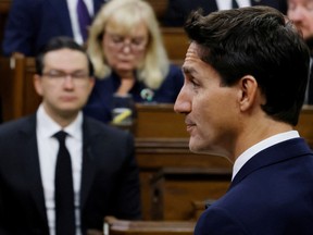 Canada's Prime Minister Justin Trudeau, watched by Conservative Party of Canada leader Pierre Poilievre, speaks in the House of Commons on Parliament Hill in Ottawa, Ontario, Canada September 15, 2022. REUTERS/Blair Gable