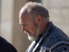 Christopher Duke leaves Court of King's Bench on Oct. 17, 2022 in Regina.