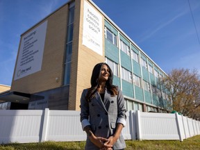 Neha Jain, communications director, stands outside the old downtown YMCA building, which is set to soon become The Nest Health Centre, on Wednesday, October 19, 2022 in Regina.