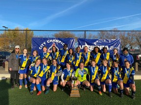 The O'Neill Titans are shown Saturday at Leibel Field after winning the Regina High Schools Athletic Association's 5A girls soccer title.