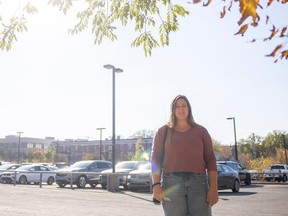 Kayla McInnis, an RN working at Regina General Hospital stands for a portrait at the staff parking lot at RGH on Monday, October 3, 2022 in Regina. The province has now put out a tender to get the parkade project officially underway, which McInnis said is "relieving" to hear.