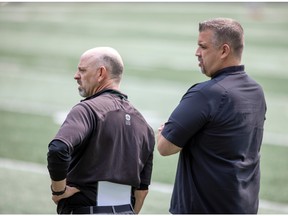 Saskatchewan Roughriders head coach Craig Dickenson, left, and Jeremy O'Day, right, will be on expiring contracts in 2023.