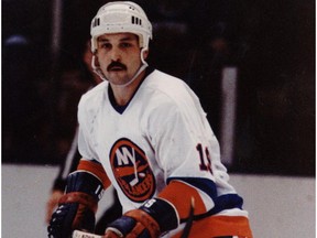 Bryan Trottier, shown with the New York Islanders in 1984, has just released an autobiography — All Roads Home.