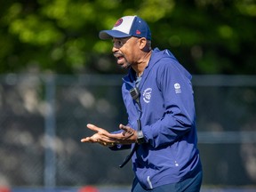 MONTREAL, QUE.: \May\ 25, 2022 -- Montreal Alouettes head coach Khari Jones encourages his players during training camp practice in Trois-Rivieres, east of Wednesday May 25, 2022.