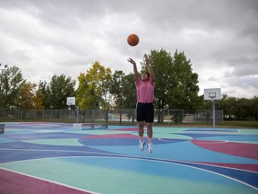 Brianna LaPlante practices shooting hoops on basketball courts she designed in Regent Park.