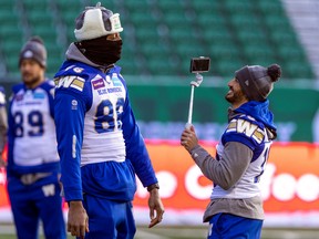 Winnipeg Blue Bombers wide receiver Carlton Agudosi is recorded by Winnipeg Blue Bombers kicker Ali Mourtada during walk-though practice at Mosaic Stadium on Saturday.