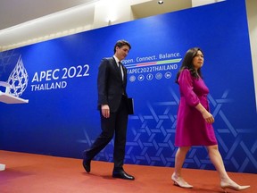 Prime Minister Justin Trudeau is joined by Minister of International Trade Mary Ng after a news conference following his participation in the APEC summit in Bangkok, Thailand, Nov. 18, 2022. Federal officials are set to make an announcement about Canada's long-promised Indo-Pacific strategy in Vancouver today.