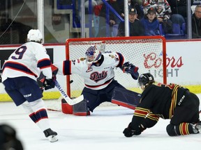 Regina Pats goalie Drew Sim makes one of the 47 saves he registered in Friday's 3-0 victory over the Vancouver Giants at the Langley Events Centre.