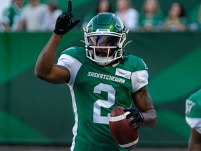 The Saskatchewan Roughriders' Mario Alford, shown celebrating a touchdown July 24 against the visiting Toronto Argonauts, was not named an all-star Wednesday even though he is the West Division's finalist for the CFL's most outstanding special teams player award.
