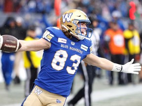 The Winnipeg Blue Bombers' Dalton Schoen celebrates a 19-yard touchdown reception in Sunday's CFL West Division final against the visiting B.C. Lions.