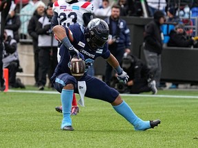 Toronto Argonauts running back Andrew Harris celebrates a six-yard touchdown run in Sunday's East Division final against the Montreal Alouettes.