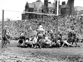 The Toronto Argonauts and Winnipeg Blue Bombers are to meet in a Grey Cup for the first time since 1950, when the Mud Bowl was played at Varsity Stadium. Argonauts quarterback Al Dekdebrun — on the ground, fourth from left — is shown falling over the goal line for the game's only touchdown.