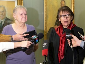 Marlene Bear, left, and Myrna LaPlante speak to reporters after details about the new Missing and Murdered Indigenous Women and Girls+ (MMIWG+) Community Response Fund was announced at the Legislative Building.
