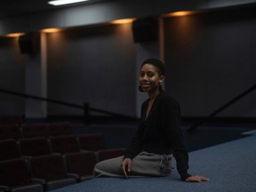 Alyssa Fearon who oversees direction and selection at the Regina Public Library's Film theatre, sits for a portrait inside the theatre.