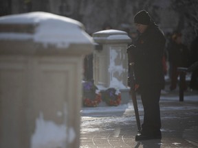 A cadet holds a rifle at the Remembrance Day ceremony at the Cenotaph in Victoria Park in Regina on Nov. 11, 2022