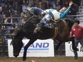 Pascal Isabelle rides Oh Bla Di in Bareback during the opening night of the Maple Leaf Finals Pro Rodeo at the Brandt Centre on Wednesday.