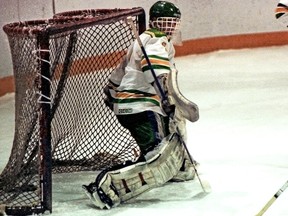 Rod Hook, shown here while playing for the University of Regina Cougars men's hockey team, was a member of the Cougars Hall of Fame, goaltender coach for the Cougars hockey team, and father of current Cougars hockey player Eric Hook. I have. Photo courtesy of U of R Photography.