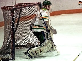 Pictured here during his playing days with the University of Regina Cougars men's hockey team, Rod Houk is a member of the Cougars Hall of Fame, a goalkeeping coach for the Cougars hockey team, and the father of current Cougars hockey player Eric Houk. Photo courtesy of U of R Photography.