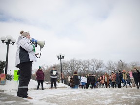 Morgan Orthner speaks to a crowd during a solidarity protest and call to action is a protest being held at the Legislative Building.