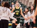 Julia Vydrova (15), a product from Prague, stood out during her position on the women's basketball team of the University of Regina Cougars.  Photo courtesy of Arthur Ward/Arthur Images