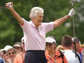 Kathy Whitworth responds to the crowd as she prepares to tee off during the Tournament of Champions golf tournament at Locust Hill Country Club in Pittsford, N.Y. on June 20, 2006.