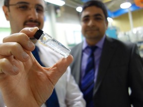 College of Engineering PhD student Amin Babaeighazvini and Prof. Bishnu Acharya with a sample of plant-based glitter.