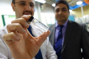 College of Engineering PhD student Amin Babaeighazvini and Prof. Bishnu Acharya with a sample of plant-based glitter.