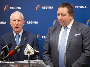 City councillor Bob Hawkins, left, and REAL CEO Tim Reid discuss the Catalyst Committee's results of its recent online survey about five potential recreation and culture facility projects to revitalize Regina.