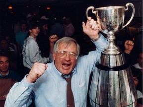 Roughriders head coach John Gregory celebrates with the Grey Cup in 1989.