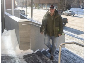 Former political candidate and activist Mark Friesen walks into the Provincial Court on Friday, December 16, 2022 in Regina. The Saskatoon-based man is on trial for violation of a public health order.