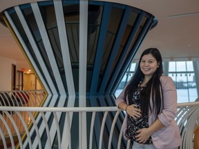 Jana Sasakamoose, a masters student who was involved in a research project aimed at garnering more interest in science among Indigenous youth and students, stands for a portrait inside the First Nations University on Dec.r 9, 2022.