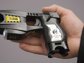A police-issued Taser gun is displayed at the Victoria police station in Victoria, B.C. May 7, 2008.