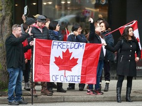 Protesters gather on Burrard Street with thousands of others during a COVID demonstration in Vancouver February 5, 2022.