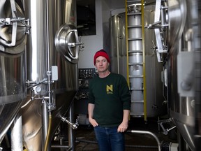 Owner Jeff Allport stands for a portrait at the brewery for Nokomis Craft Ales in February.