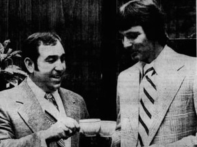 Saskatchewan Roughriders head coach John Payne is shown with newly signed quarterback Randy Mattingly in 1974.