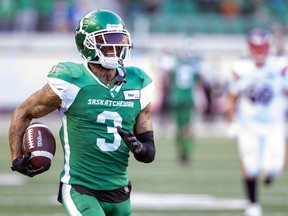 The Saskatchewan Roughriders have re-signed cornerback Nick Marshall, who is shown July 2 while in the process of scoring his franchise-record fifth career interception-return touchdown.
