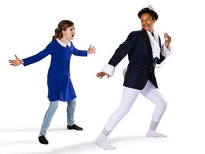 Myalle Roffey (Alice) and Lily Grynspan (White Rabbit) of Do It With Class Young People's Theatre are shown during a recent rehearsal for Alice in Wonderland. Supplied photo.