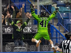 Saskatchewan Rush's Dan Lintner jumps up for joy after scoring the first goal of the game against Colorado Mammoth at SaskTel Centre in Saskatoon on Dec. 3, 2022.